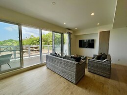 Coral Palace Onna by Sunset Avenue