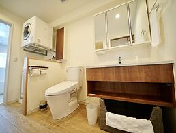 Coral Palace Onna by Sunset Avenue