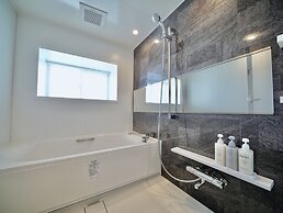 Coral Palace Onna by Sunset Avenue