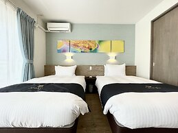 Coral Palace Onna by Sunset Avenue