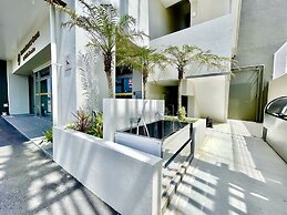 Coral Palace Onna by Sunset Avenue