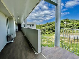 Coral Palace Onna by Sunset Avenue