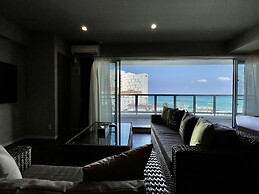 Coral Palace Onna by Sunset Avenue