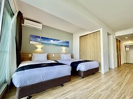 Coral Palace Onna by Sunset Avenue