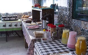 Pousada Guarubela Veloso