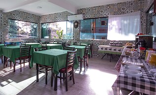 Pousada Guarubela Veloso