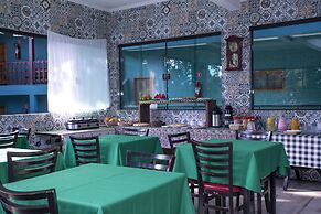 Pousada Guarubela Veloso