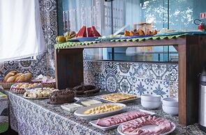 Pousada Guarubela Veloso