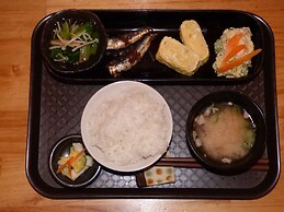 Guesthouse Hyakumanben Cross