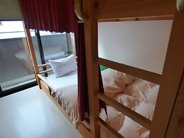 Guesthouse Hyakumanben Cross
