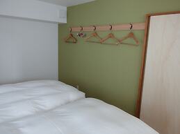 Guesthouse Hyakumanben Cross
