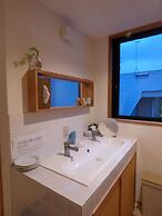 Guesthouse Hyakumanben Cross