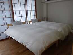 Guesthouse Hyakumanben Cross