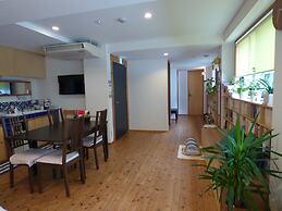 Guesthouse Hyakumanben Cross