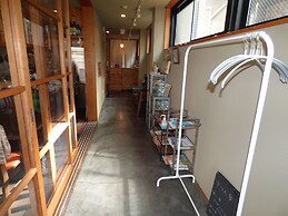 Guesthouse Hyakumanben Cross