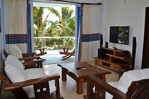 Cowrie Shell Beach Apartments