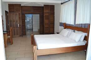 Cowrie Shell Beach Apartments