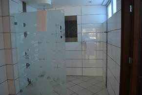 Cowrie Shell Beach Apartments