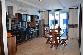 Cowrie Shell Beach Apartments