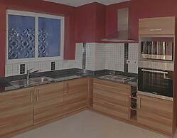 Cowrie Shell Beach Apartments