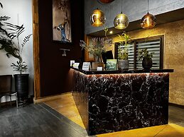 Roots Hotel Apartment