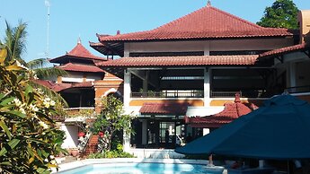 Puri Naga Beachfront Cottages