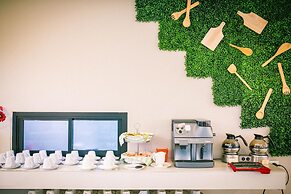 De Hug Hotel & Residence