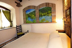 Chalet sul lago Hotel In Montagna