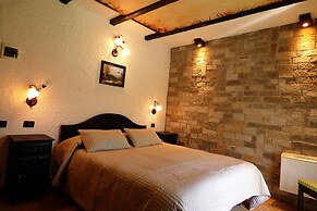 Chalet sul lago Hotel In Montagna