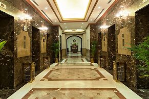 Magnum Hotel & Suites West Bay