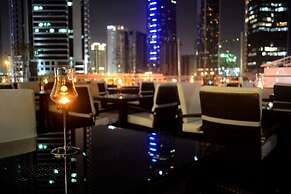 Magnum Hotel & Suites West Bay