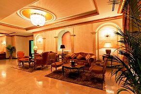 Magnum Hotel & Suites West Bay