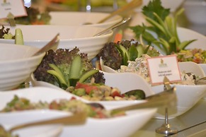 Magnum Hotel & Suites West Bay