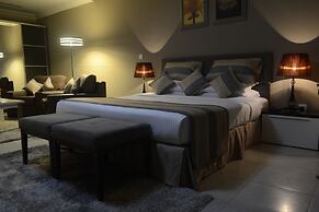 Magnum Hotel & Suites West Bay