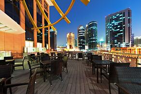 Magnum Hotel & Suites West Bay