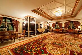 Magnum Hotel & Suites West Bay