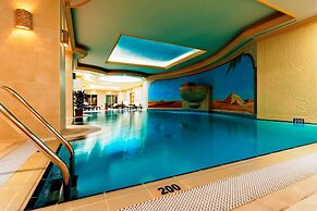 Magnum Hotel & Suites West Bay