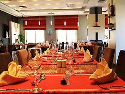 Magnum Hotel & Suites West Bay