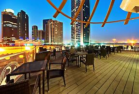 Magnum Hotel & Suites West Bay