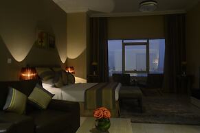 Magnum Hotel & Suites West Bay