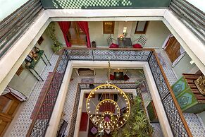 Riad l'heure D'été