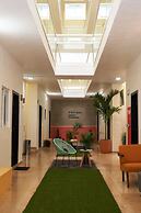 Nora Hotel & Co living