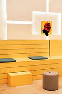 Nora Hotel & Co living