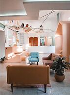 Nora Hotel & Co living