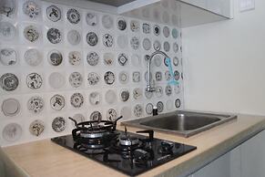 Comfortable 2BR Apartment at Grand Asia Afrika Residence near Alun Alu