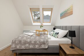 Zielona 11 Apartments by Renters