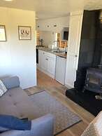 Cosy and Rural Lodge at Goldhill Glamping