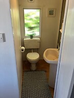 Cosy and Rural Lodge at Goldhill Glamping