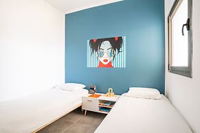 Vibrant Seaside Stay with Balcony by Sea N' Rent