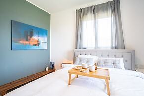 Vibrant Seaside Stay with Balcony by Sea N' Rent